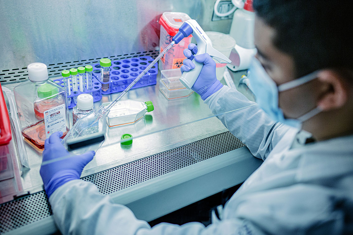 UCLA mathematician and Fields Medal winner Terence Tao smiling near a chalkboard